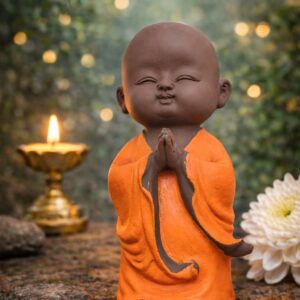 Cute monk Buddha statue for home decor with peaceful meditation pose